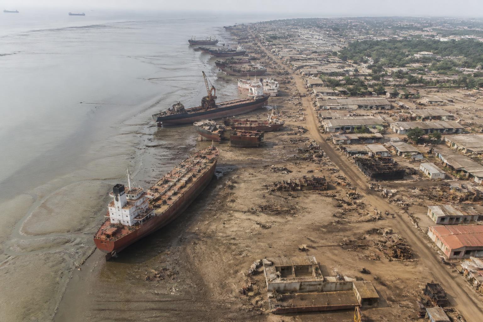Aerial view of ship recycling plots along the Alang coastline in Gujarat, India